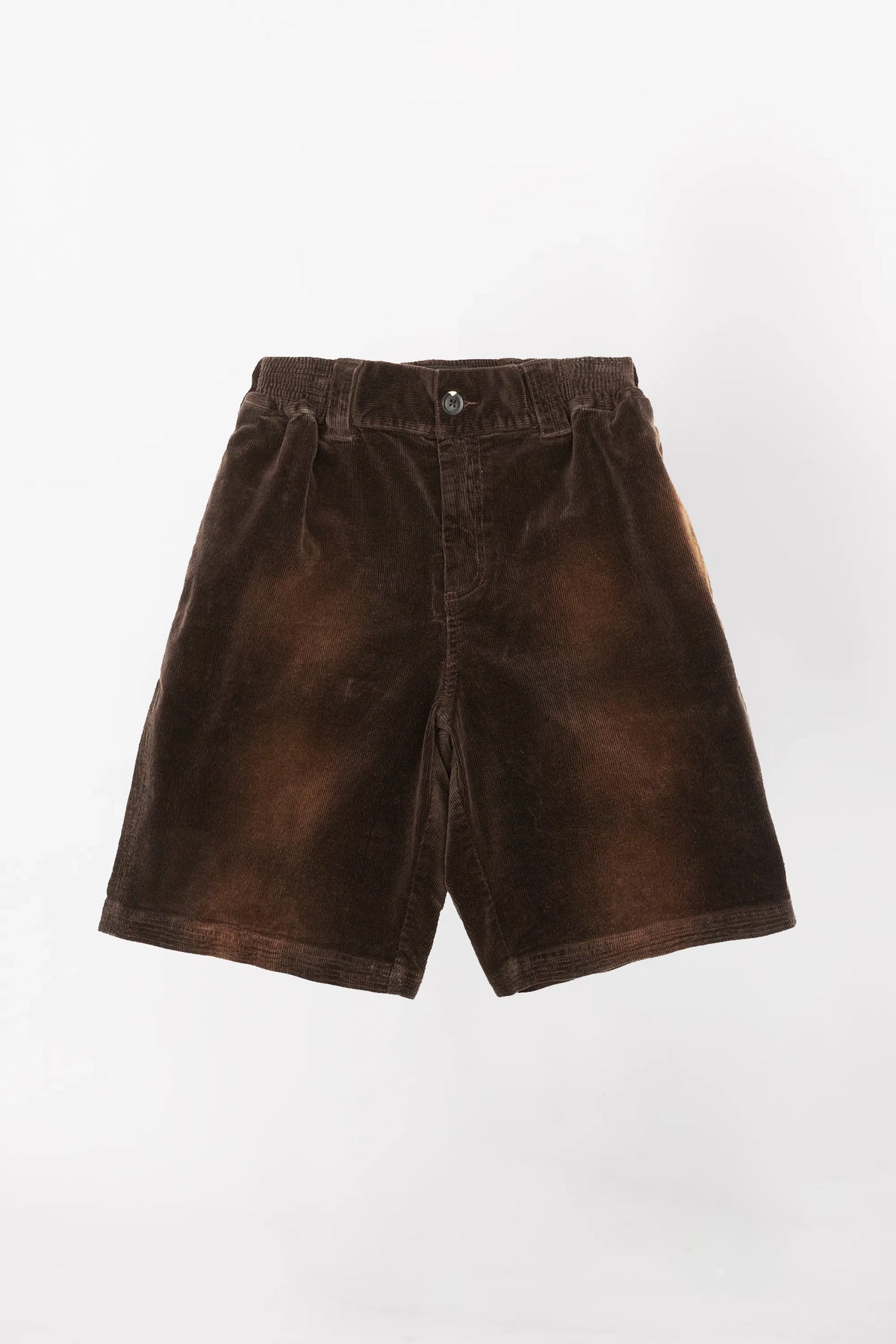 A pair of brown corduroy baggy shorts with an elastic waistband and button closure.