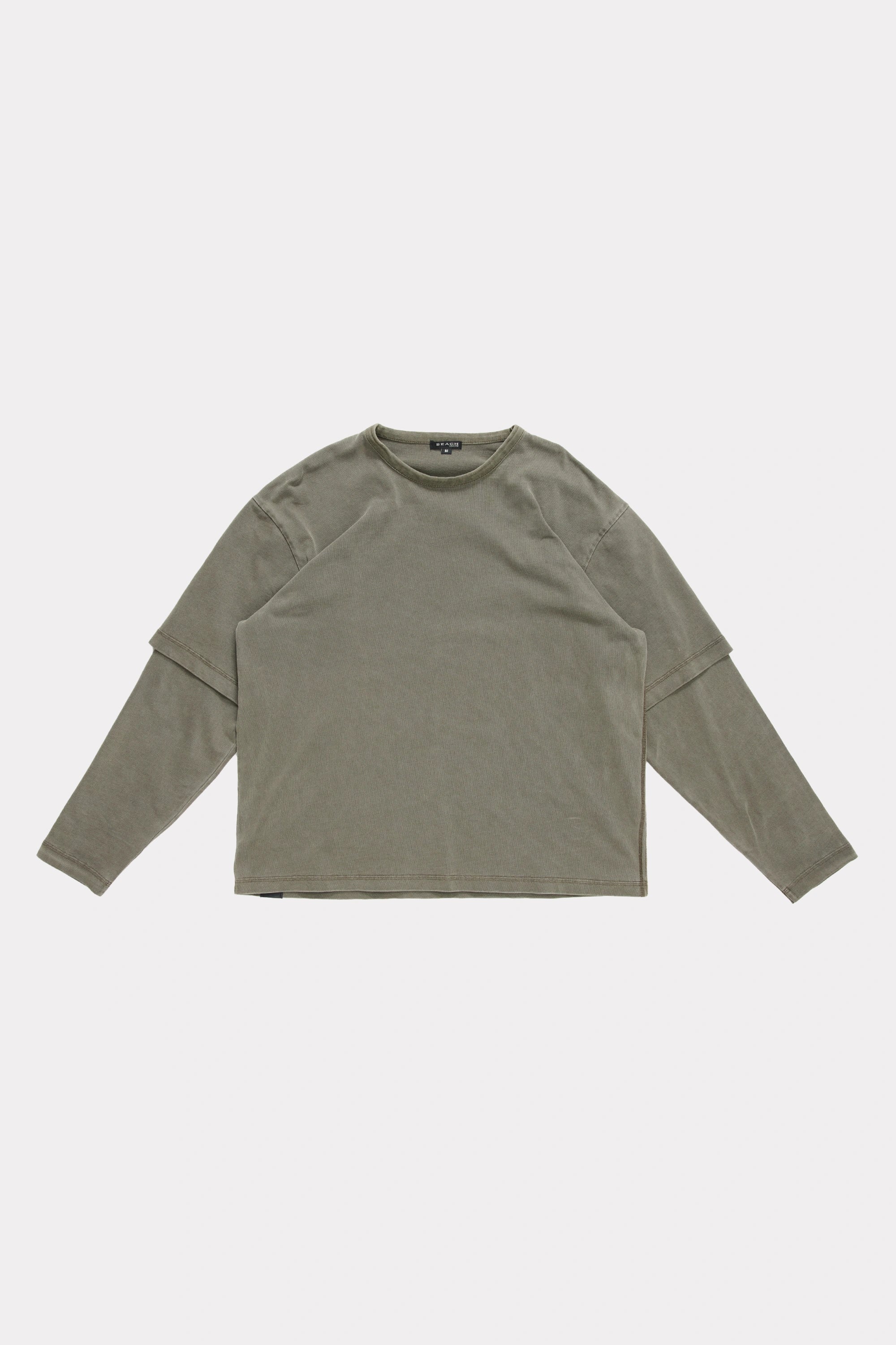 Fatigue Dream Layer Long Sleeve Shirt on a light grey background