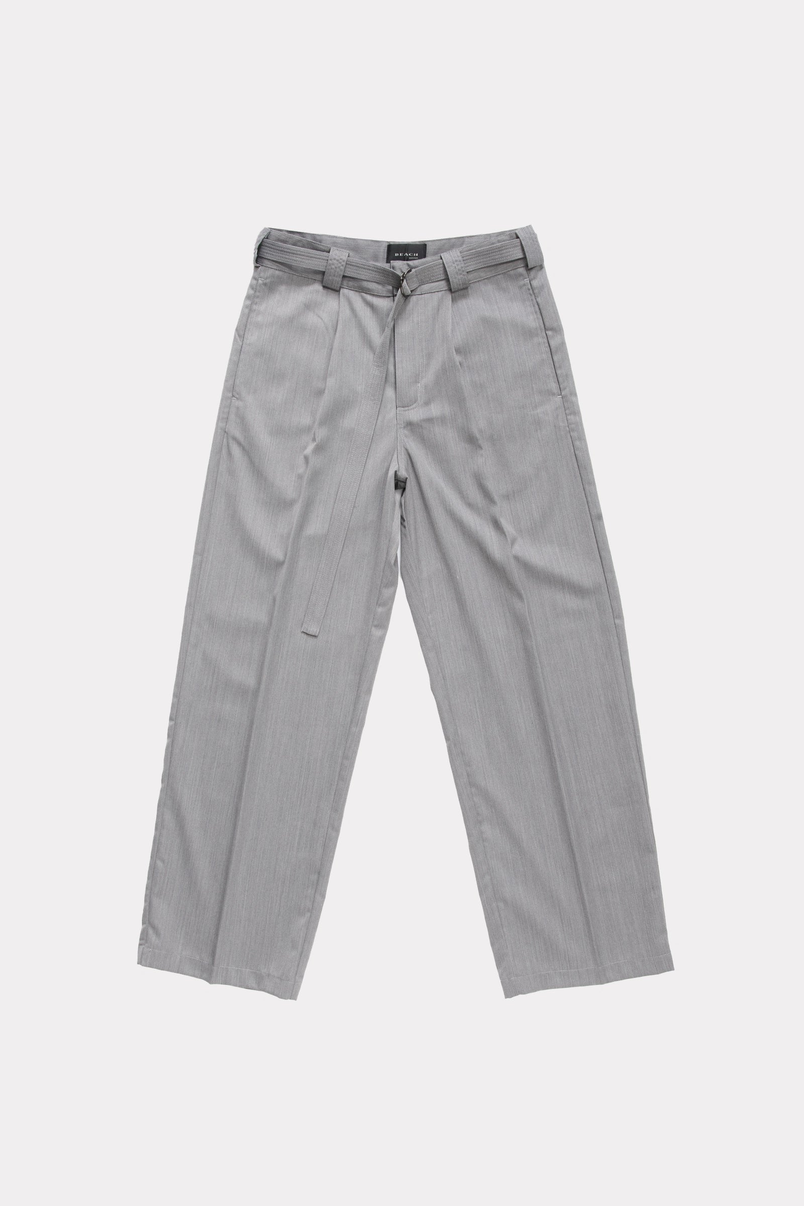 Grey trousers on a white background