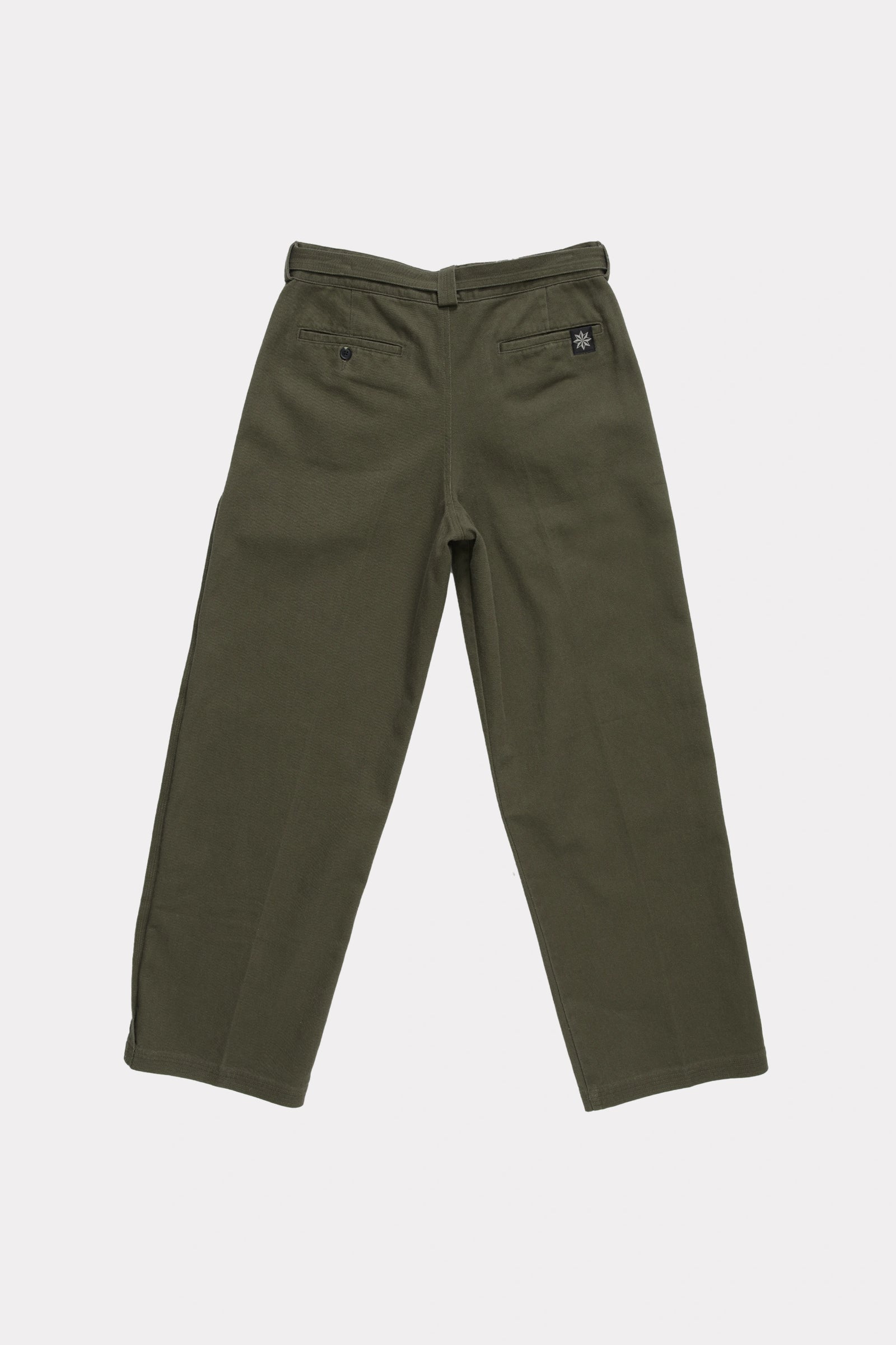Rear view of a pair of green pleated work pants on a white background