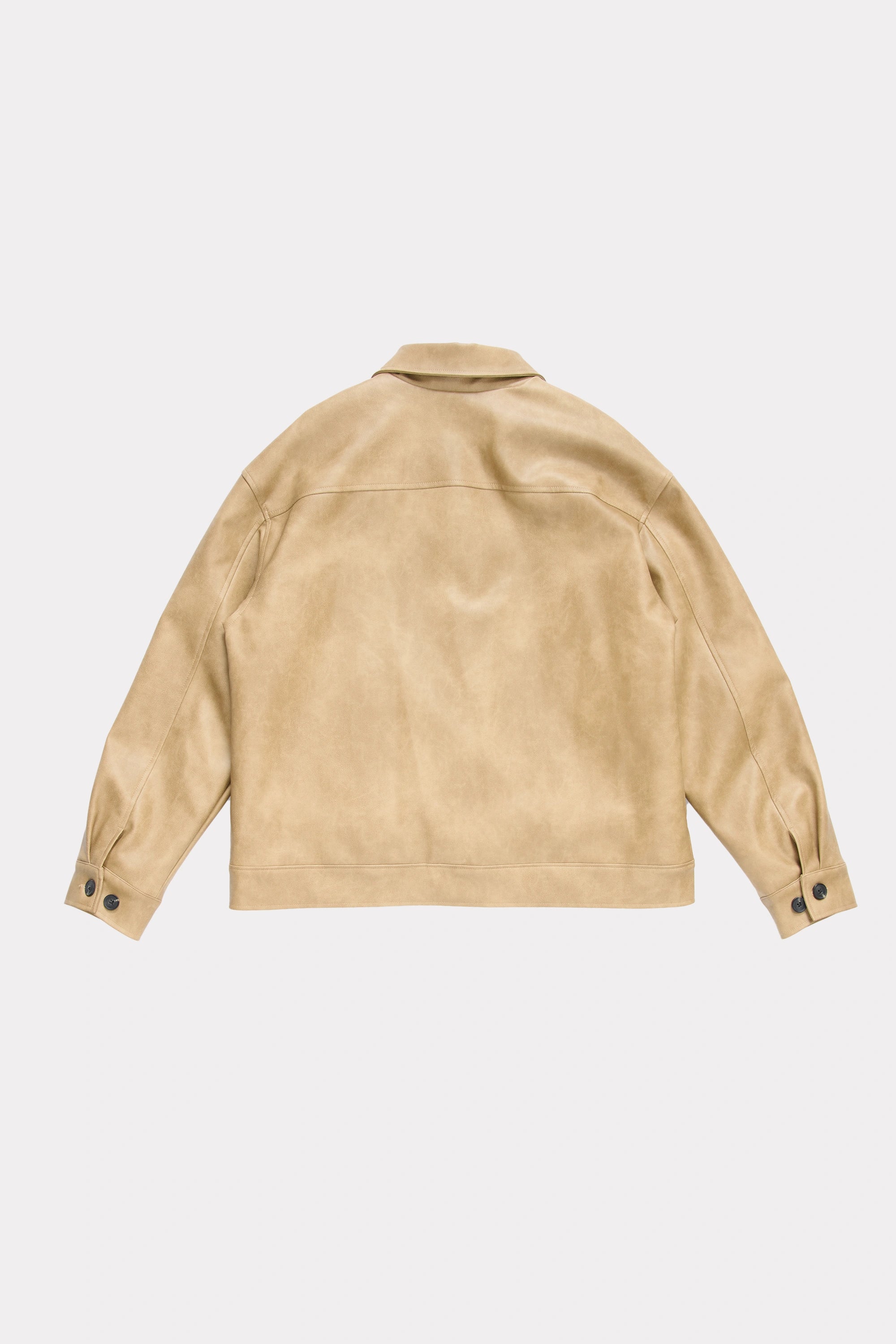 View of the back of a beige leather jacket on a light grey background