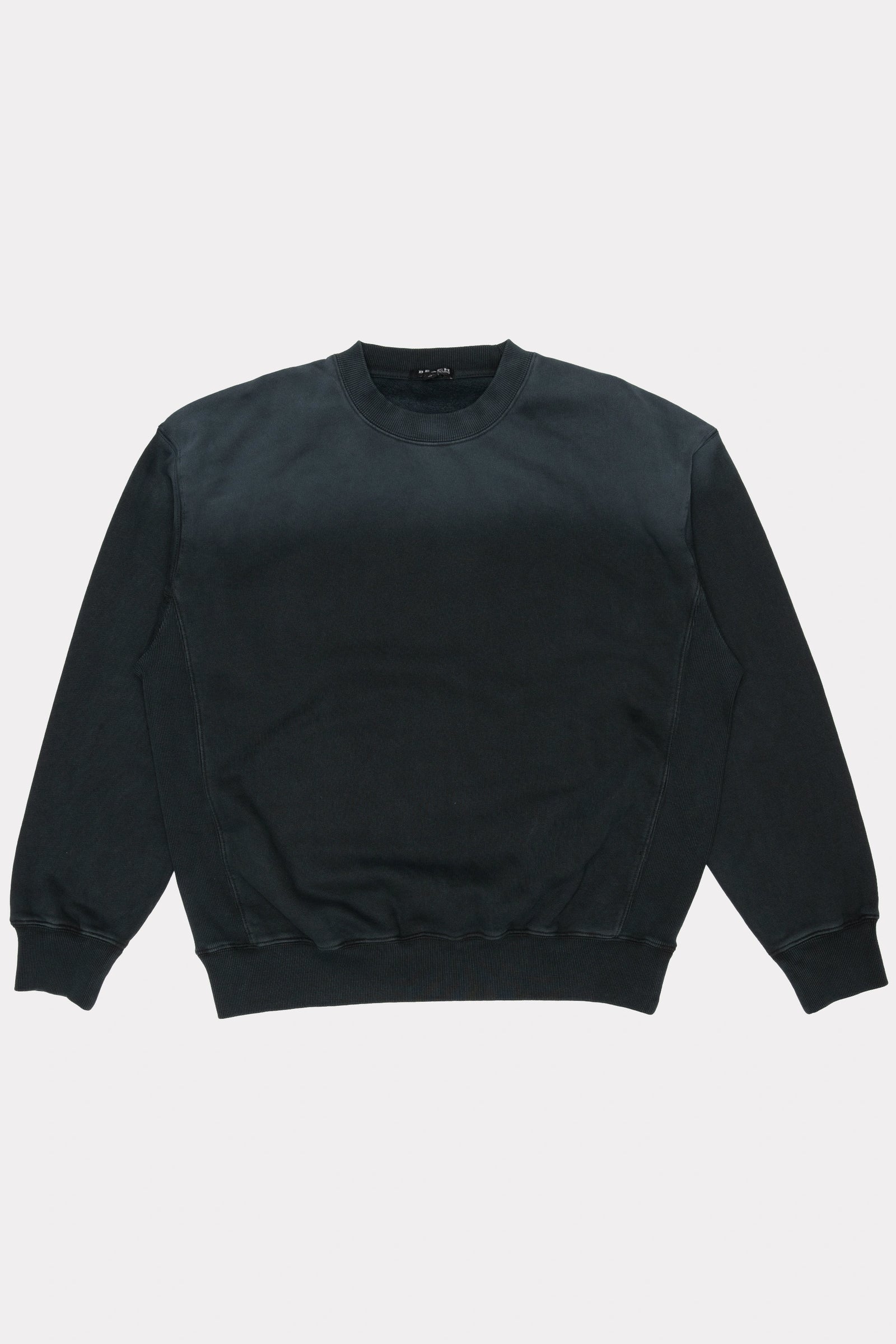 Black sweatshirt on a light grey background